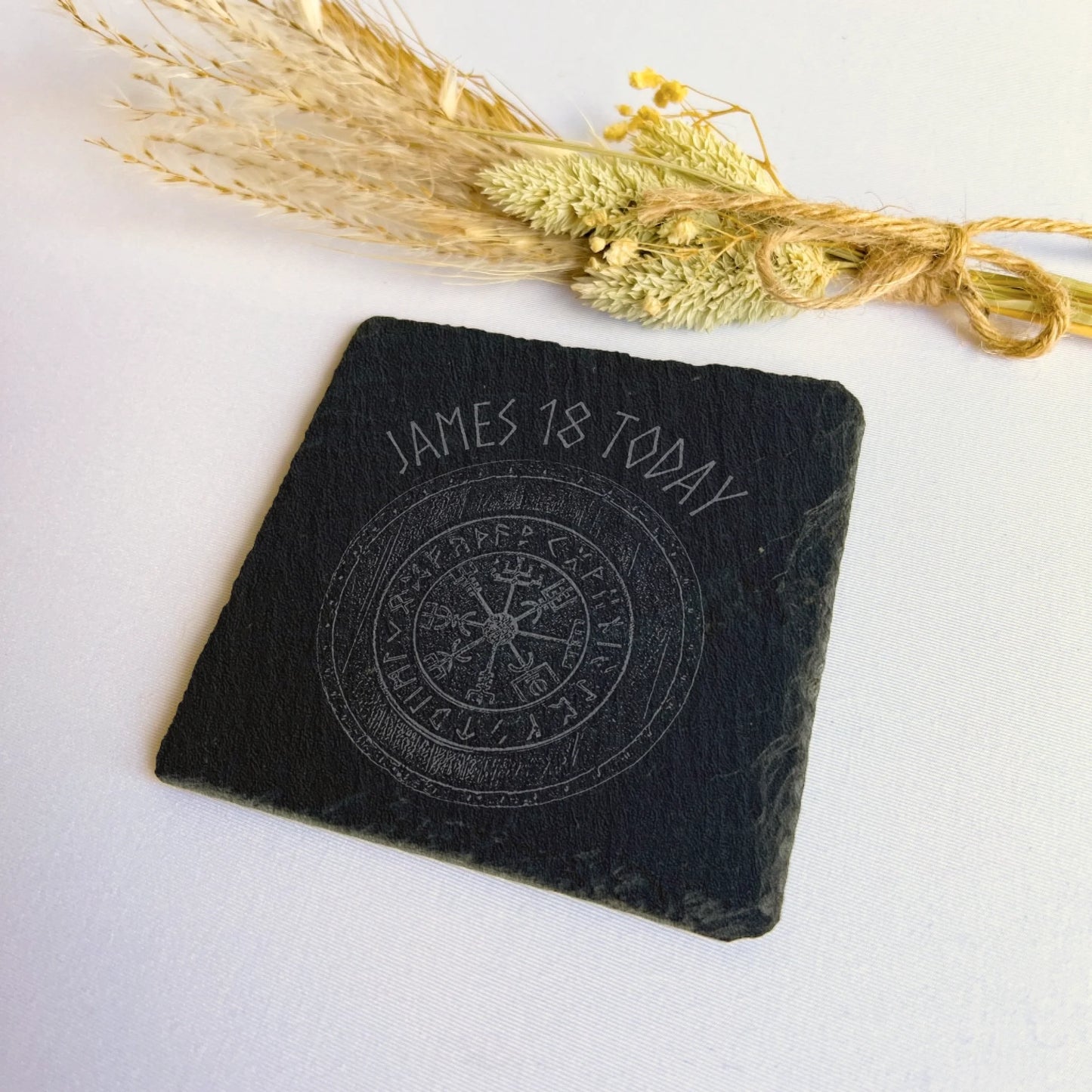 compass gift for him Square black slate coaster on a white surface with dried grasses, natural hand-cut edges, 10 cm square (4 in).