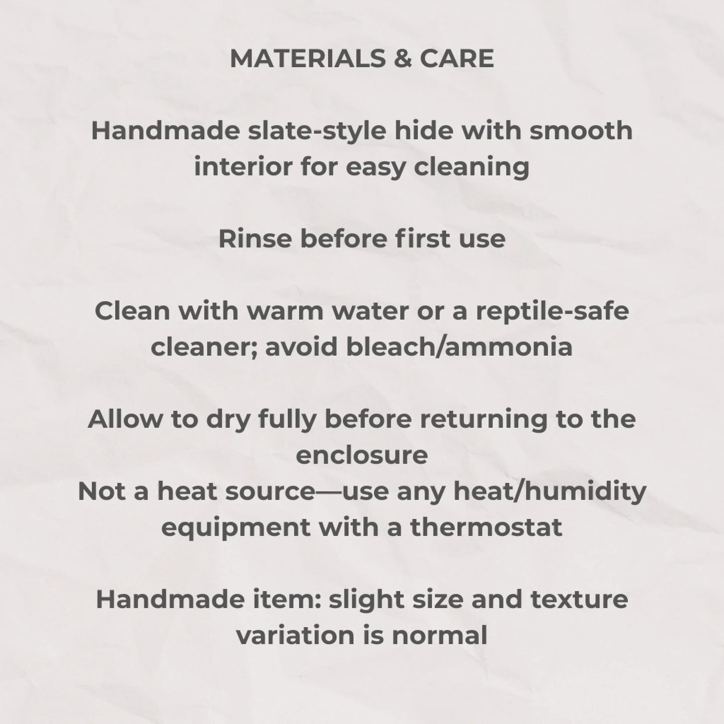 Care guide for handmade slate reptile hide with cleaning and safety instructions in neat black text.
