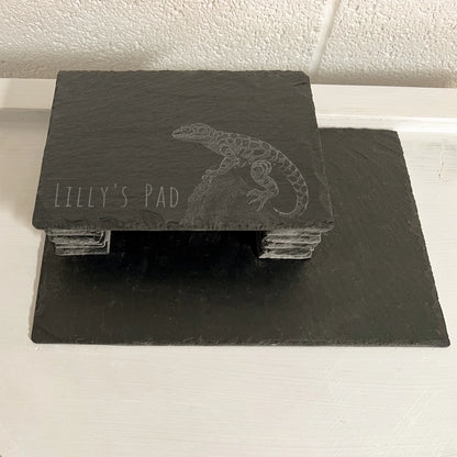 Leopard Gecko Slate reptile hide with rectangular roof and stacked slate side walls on a larger base on a white surface.